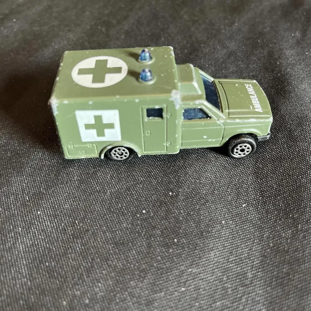 Vtg. Majorette Lot Of 4, ELF Truck, AMBULANCE, MILITARY POLICE & Coke Corvette